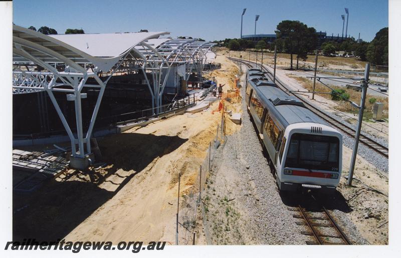 P21072
AEB class 229 without a coloured stripe on the top of the sides, on a two car EMU set, passing Subiaco station under construction. ER line
