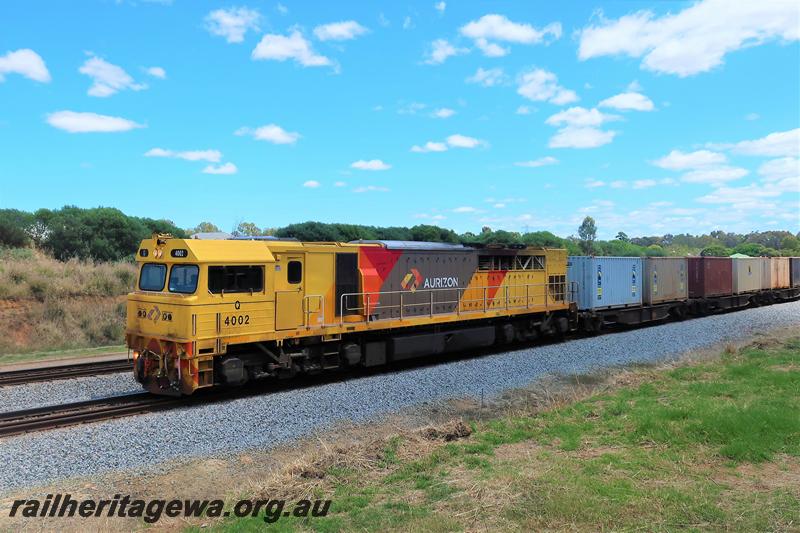 P21137
Aurizon Q class 4002 in the yellow livery with the red and grey panels heads a freight train southwards through Hazelmere
