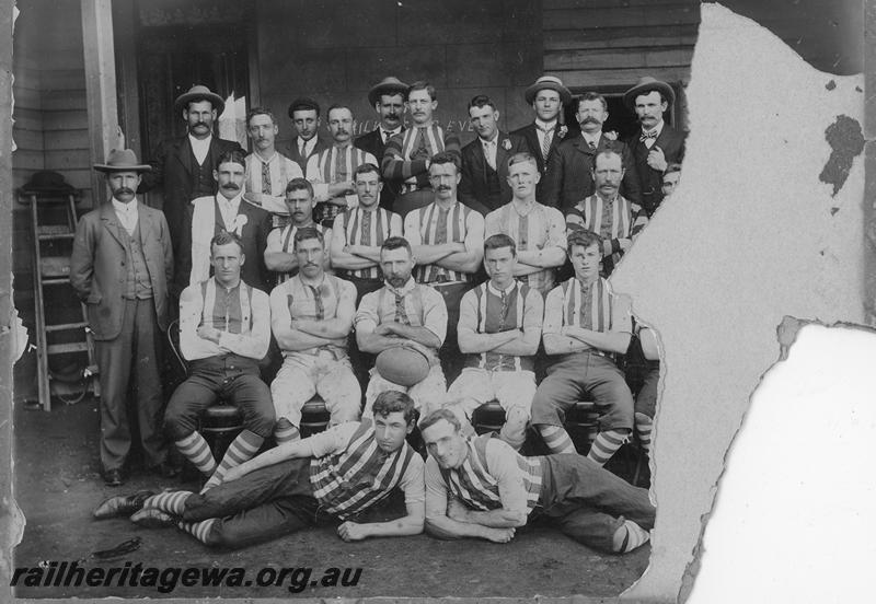 P21139
Southern Cross Railway Foorball Club, c1907, players in lace up tops and breeches, Group photo with officials (damaged photo)
