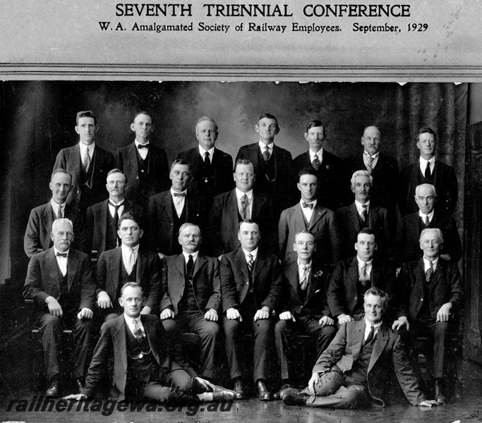 P21143
Seventh Tiiennial Conference of the W.A. Amalgamated Society of Railway Employees, group photograph: Back Row: C.J. Peters (Northam) F.C. Towler (Pinjarra) J.B. Williams (Bunbury) , W. Rothnie (Collie) H. Stevens (Minute Secretary) ; J. Burhop (Merredin) W.E. Sterrett (Geraldton)  2nd Row: A.W. Jordan (Albany), C.H. Venner (Katanning) , W. Manning (Midland Junction) , A.E. Scott (Southern Cross) ,C.E.D. Williams (Mullewa), F.J. Mckenney (Fremantle) , J. Jeffery (Perth)  3rd Row: J. Pirani (Kalgoorlie) , G.F. Keating (General Secretary). A. Meyers (General Vice President), A.H. Phillips (General President), R. Halliday (General Treasurer) W. Baker (Busselton) J. Watters (Chidlow)  4th Row: C.V. Fawcett (Cue), A.L.  Stewart (Narrogin) (See photo P21143)

