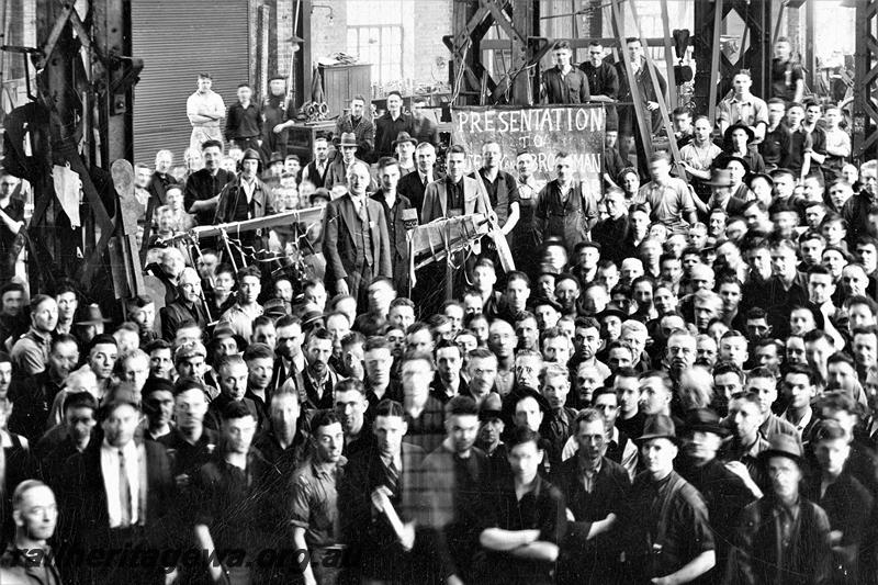 P21146
Midland Workshops workers assembled for the presentation to Jack Kelly and Frank Brookman when they joined the RAAF (Ref: Troops, Trades and Trains by Philippa Rogers)
