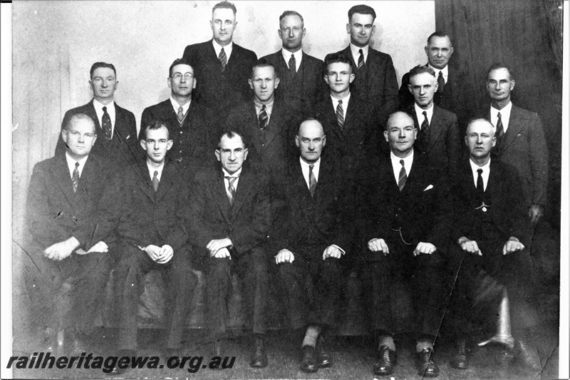 P21151
18th Delegate Railway Officers Union conference, Group Photograph: Back Row: F.A. Riley (Northam) K.T.E. Lund (A & N.S.M.'s) H. F. Holland (C.M.E.'S) A. Polglaze (Perth) Second Row: A.E. Walker (Collie) H.S. Ashdown (Merredin) S.L. LeLievre (Kalgoorlie), R.J. Pascoe (Geraldton), A.M. Allan (Fremantle) C.D. Prior (Bunbury) Front Row: J.A. Cooke (Administrative) E.C. Tyler (Assistant General Secretary) T. Kenafick(General Secretary) E.E. Huxtable (General President), V. Bond (General Treasurer) H. McLeod (Narrogin)
