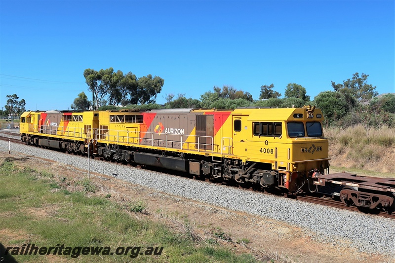 P21184
Aurizon Q class 4008 in the  yellow with grey and red panels livery   trailing Q class 4001 in the yellow with grey and red panels livery heading a freight train southwards through Hazelmere
