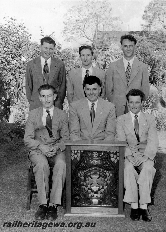 P21195
Group photo of the Winning Junior First Aid Team 1957, Back row: T. L. Banfield, F. Congdon, K. B. Warnock (coach), Front row: J. L. Craig (patient), M. Tomlin (leader), W. T. Giles, 
