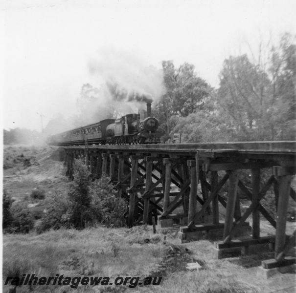 P21205
G class 112 on tour train to Wonnerup, crossing wooden trestle bridge at Boyanup, BB line
