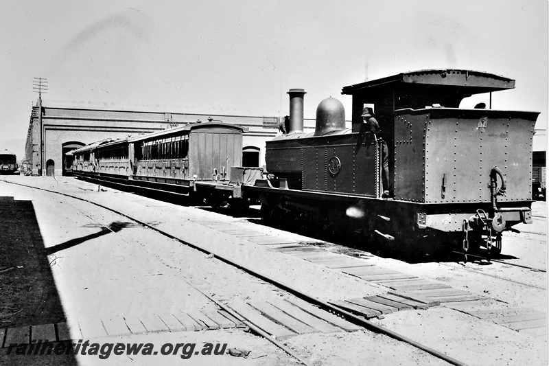 P21252
B class 14 yard shunter, moving carriages into the car and wagon shop, Midland Workshops, ER line, side and back view, c1942

