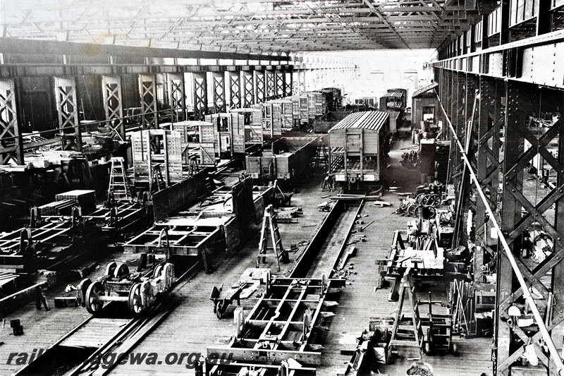 P21264
Interior view of the Wagon Shop, livestock wagons under construction, Midland Workshops, ER line, general view from elevated position, c1937
