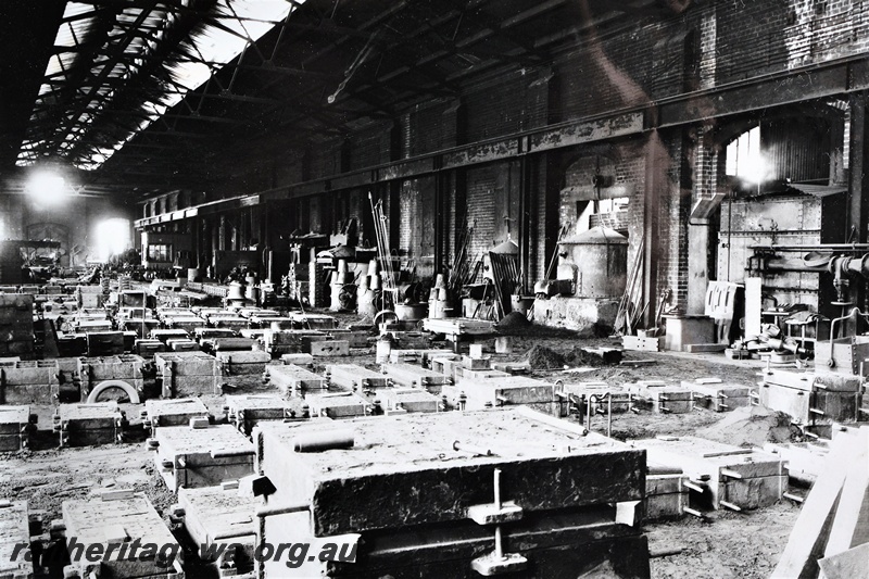 P21265
Interior view of the Metal Foundry, moulding boxes in foreground, Midland Workshops, ER line, general view from floor level, c1935
