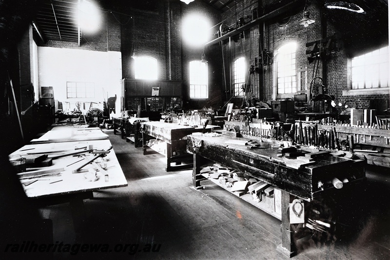 P21273
 Interior of the Pattern Shop, benches, vices, various tools, Midland Workshops, ER line, view from floor level, c1935
