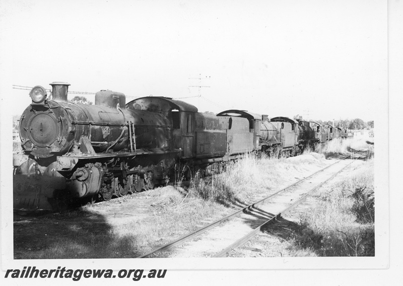 P21311
W class 926 at Collie storage yard. The locomotive is fitted with a non standard WAGR smoke box door.
