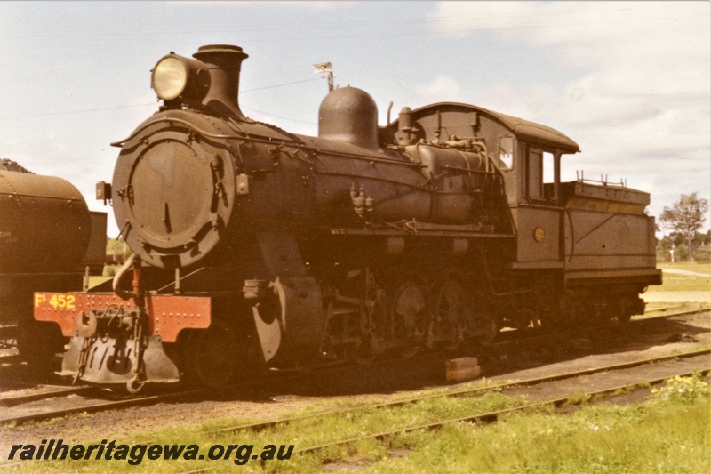 P21349
WAGR FS class 452, 4-8-0 steam loco stowed at Collie, front and side view
