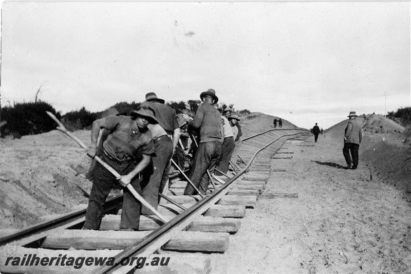 P21359
Track laying, workers, Indarra deviation, NR line, trackside view, c1936
