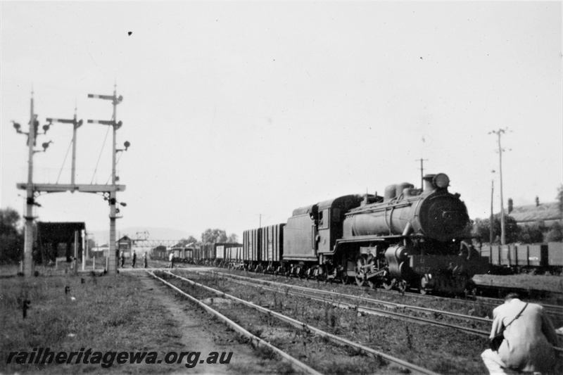 P21388
U class 657 on goods train, bracket signals, signal gantry, wagons in siding, trackside photographer, Midland, ER line, side and front view
