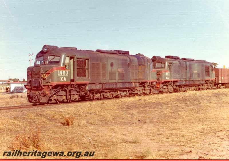 P21765
XA class 1403 and XA class 1407 approaching Merredin from Narembeen. Photo shows the two locomotives only. NKM line.
