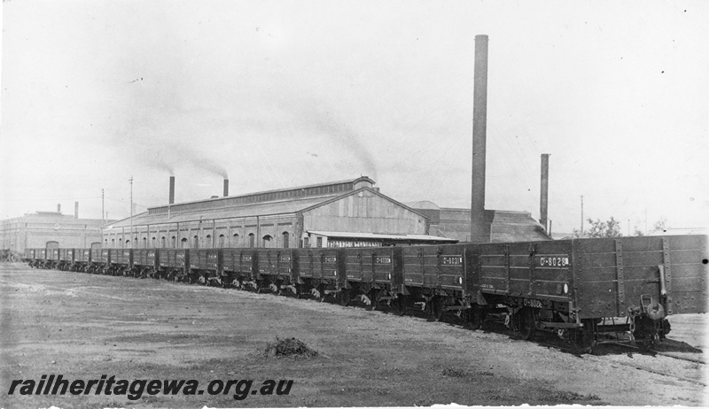 P22232
Rake of C class wagons including numbers 8027, 8028, 8029, 8030, 8031, 8032, 8033, 8034, 8035, workshop buildings, Midland, ER line, side and end views
