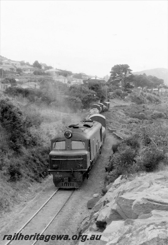 P22834
X class 1032 on goods train, departing Albany, GSR line, front and side view form elevated position
