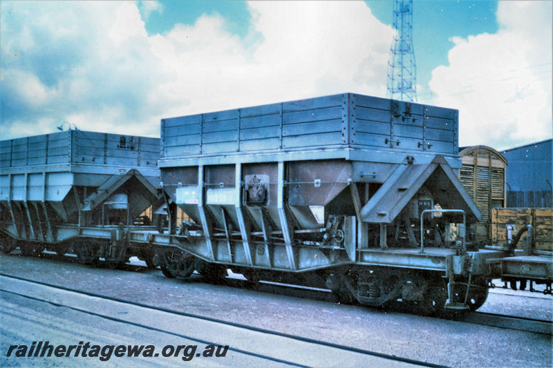 P22861
WMD class 59 hopper wagon, another WMD class hopper wagon, both with side extensions, destined for coal traffic, Leighton, ER line, side and end view 
