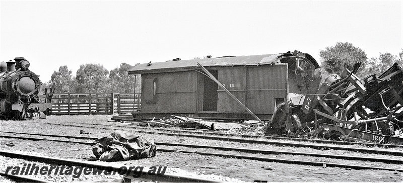 P22908
Rear end collision of No 66 Goods and AKRU 63 Goods at Frenches EM line on 22 October 1940 2 of 3, Z class 111 on side, steam locomotive, pile of wreckage, trackside view
