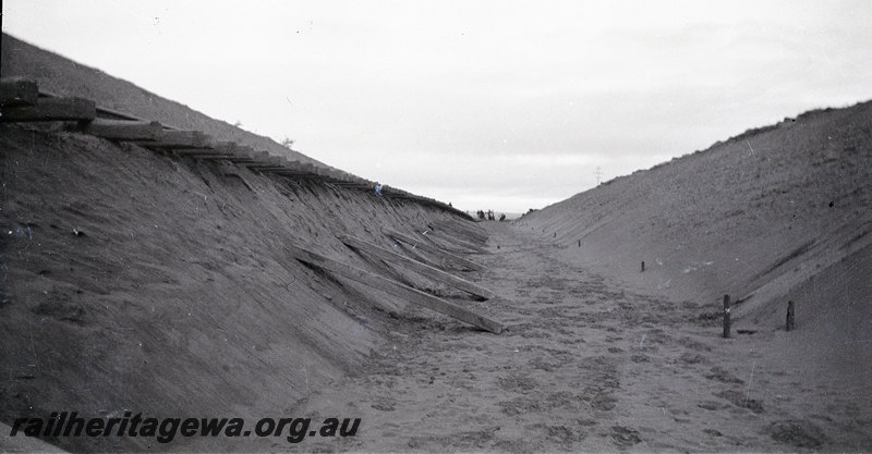 P22914
Regrading & Deviation at Indarra NR line 30 June 1935 5 of 7, cutting, sleepers, ground level view
