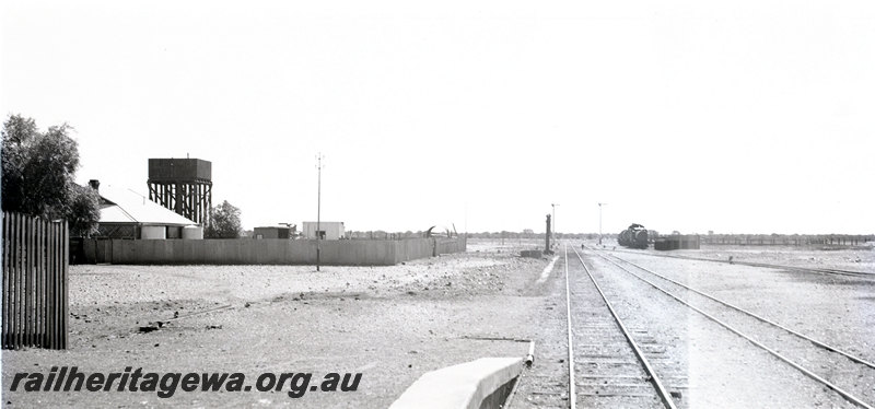 P22926
Platform end, water tower, house, tracks, yard, Malcolm, KL line, view from platform
