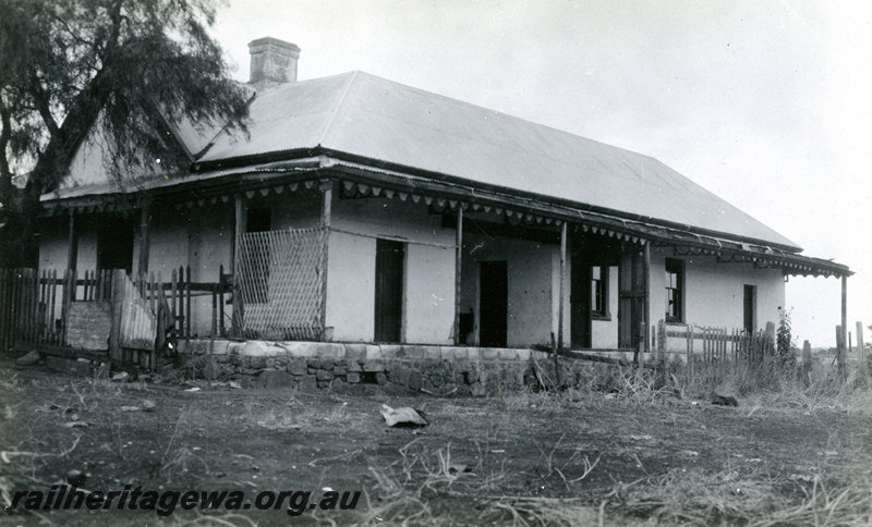 P22943
First railway station at Northampton GA line 3 of 4, house with verandas on two side, derelict condition, ground level view
