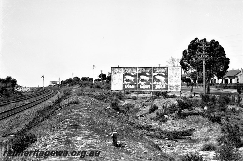 P22957
Advertising hoarding between Karrakatta and Shenton Park. Distant signals in background. ER line 
