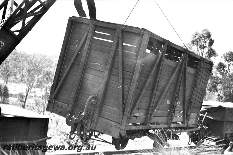 P22961
 B class 8985 cattle wagon wagon being re-railed by the 25 ton Cravens steam crane, end and sde view. 
