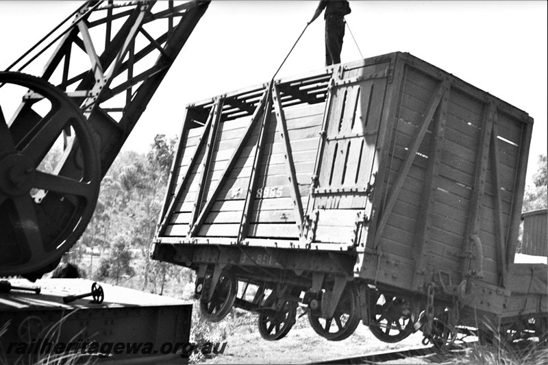 P22963
 B class 8985 cattle wagon wagon being re-railed by the 25 ton Cravens steam crane, side and end  view. Wagon is missing its springs and axleboxes
