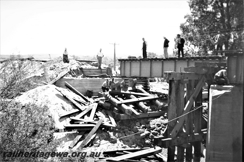 P22969
5 of  5 views of the construction Harvey River bridge. SWR line ,, view of the steel girder and concrete pylon with the remains of the tresle bidge in the background.  
