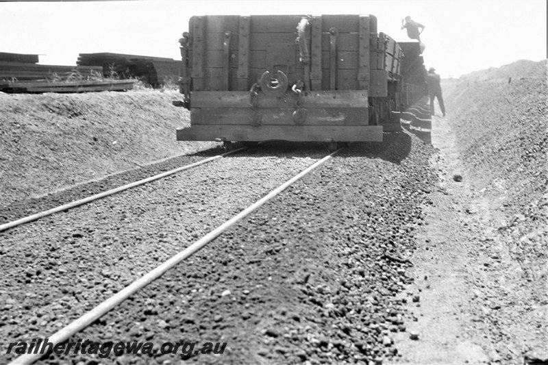 P22972
H class 3098 modified as a ballast plough coupled to a ballast hopper,end view, shows newly ballasted track
