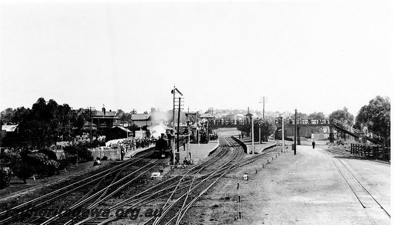 P23139
Platforms, station buildings, signals , onlookers, scissors crossover, crossover,  steam-hauled  passenger train at station, footbridge, siding, Claremont, ER line, view from elevated position, Royal Show train
