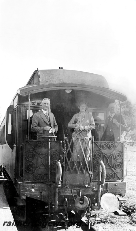 P23235
WAGR official's standing on end platform of coach AG class 38 at Eradu. NR line
