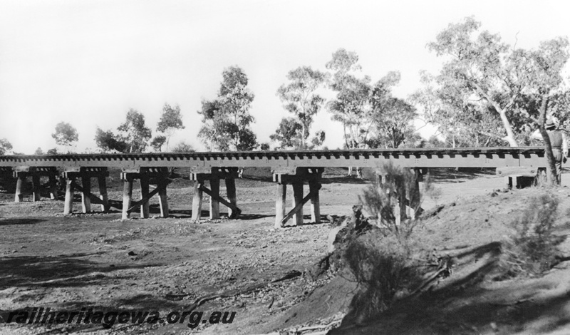 P23247
Timber trestle bridge between Mt Magnet and Sandstone. NR line, mainly a side on view
