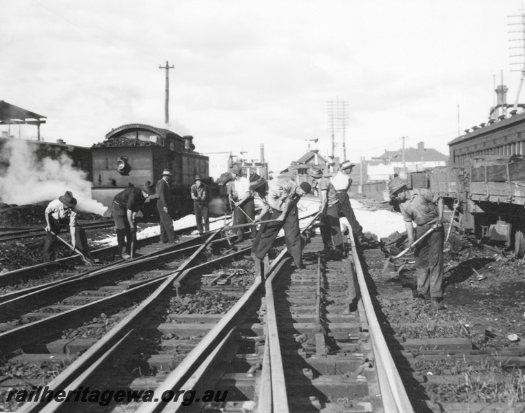 P23251
Per way gang working on lines near Perth. D class locomotive in background. ER line.
