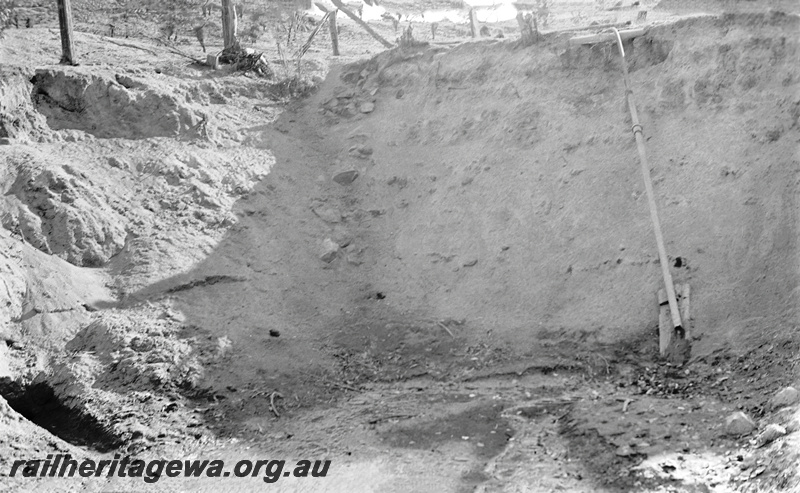 P23283
Gwambygine Water supply. Showing part of dam and pump. GSR line.
