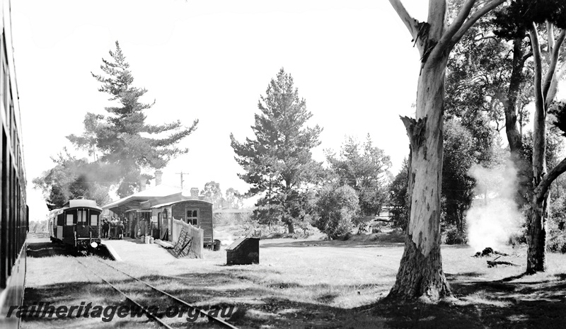 P23296
Commissioners  South West Inspection Tour train at Kirup crossing an ADE railcar towing an AG carriage. PP line.
