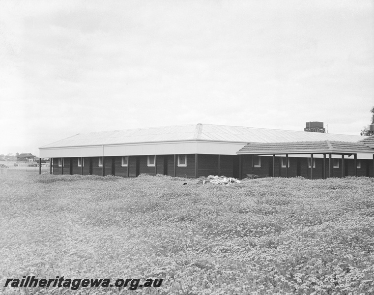 P23300
Northam barracks. Water tower with twin 25,000 gallon cast iron tanks in background. ER line.
