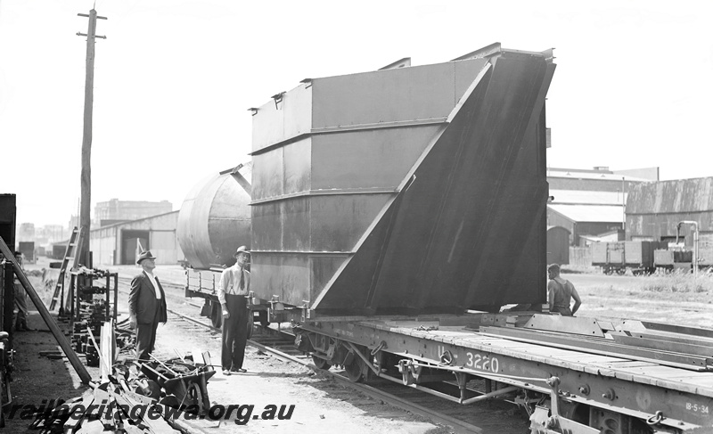 P23306
Oversized load loaded onto U class 3220 bogie flat wagon, Perth Goods  Yard. ER line.
