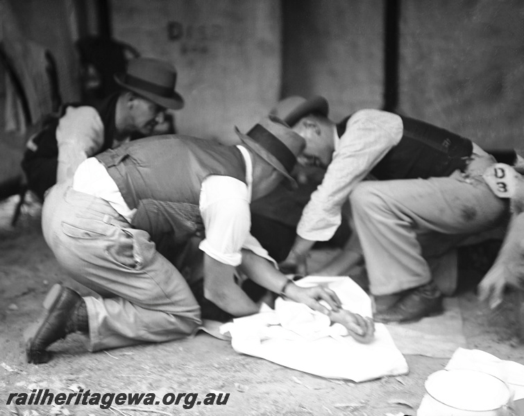 P23319
Sawyers Valley - WAGR ambulance competition  patient on ground .M line
