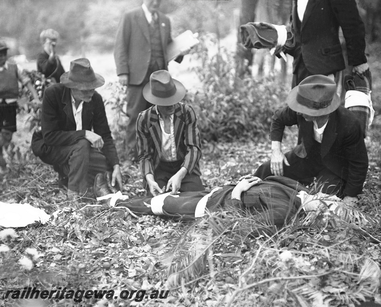 P23320
Sawyers Valley - WAGR ambulance competition - patient on ground. M line
