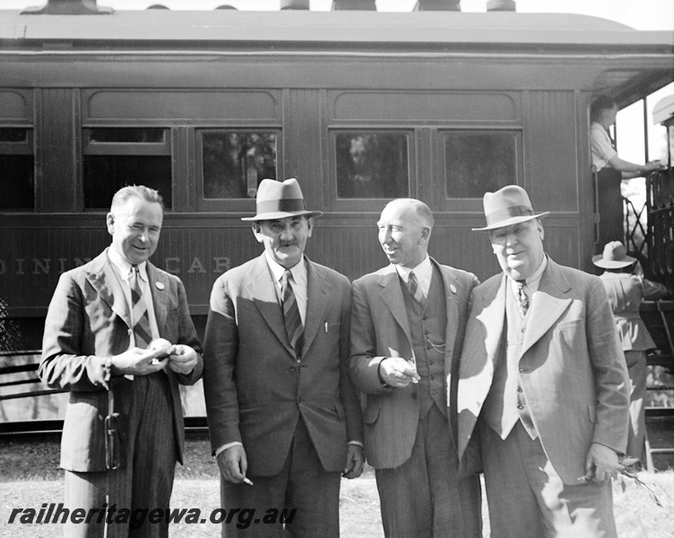 P23321
Sawyers Valley - WAGR ambulance competition - employees standing in front of dinning car. M  line
