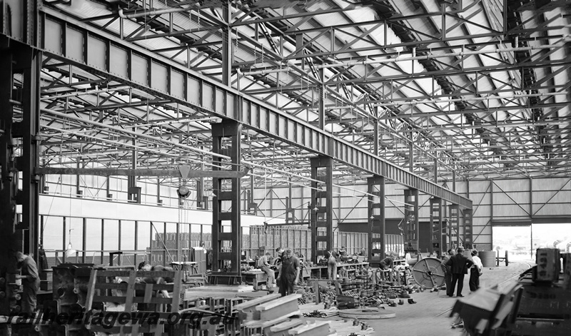 P23333
Construction of the Shell Machining Annex, internal view with workers present, Midland Workshops.  ER line.. See also P23262
