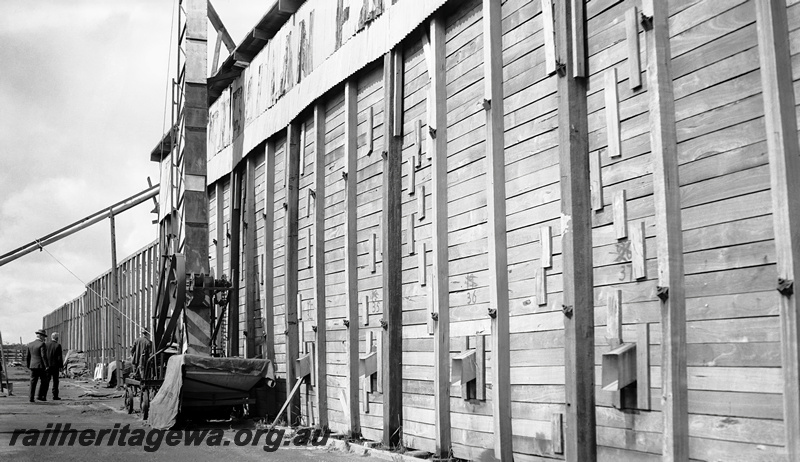 P23334
Wheat silo,constructed from timber, grain elevator, location unknown., view along the side of the slo
