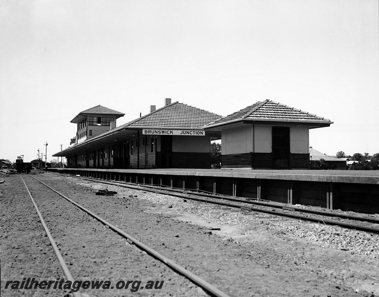 P23342
Brunswick Junction station showing station platform, building looking south. SWR line. 
