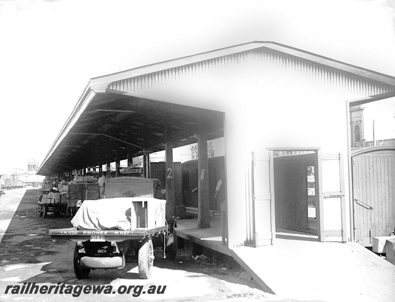 P23353
Perth Goods Yard - trucks waiting to be unloaded. ER line.
