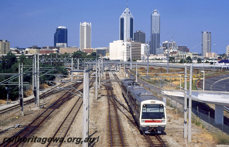 P23370
AEB class 309, AEA class 209, EMU set 09, tracks, overhead wires, city backdrop, signals, Claisebrook, ER line, side and front view from elevated position
