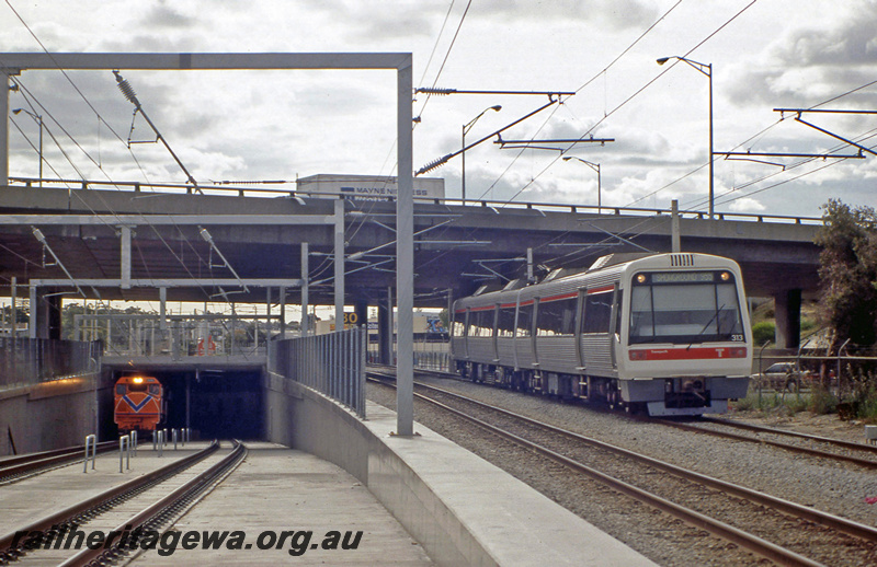 P23373
DB class 1588, AEB class 313, AEA class 213, EMU set13, overhead road bridge, wires, tracks, tunnel, Perth, ER line, front view of DB, side and end view of EMU
