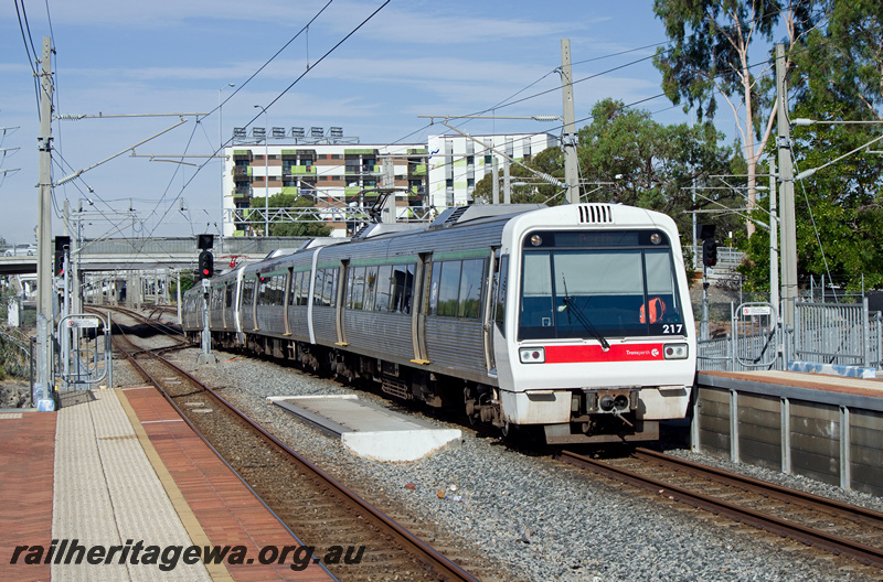 P23377
AEA class 217, AEB class 317, EMU set 17, overhead wires, tracks, platforms, overhead bridge, signals, McIver, ER line, side and end view 
