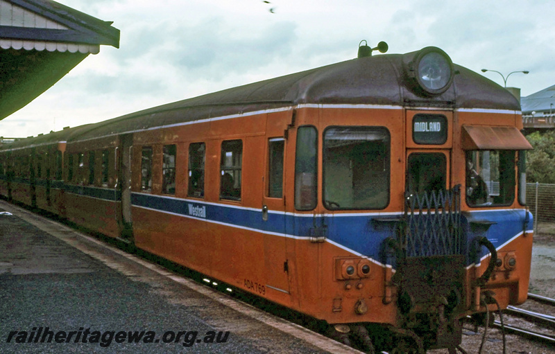 P23383
ADA class 769 trailer, on DMU set, platform, canopy, Perth station, ER line, side and end view
