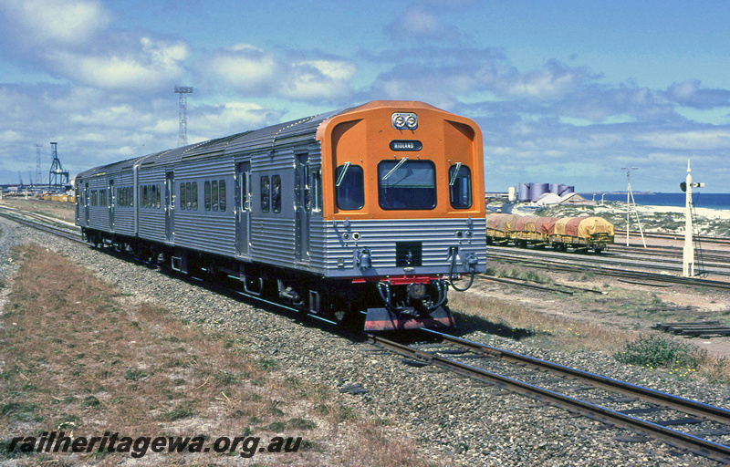 P23391
ADC class 854, ADL class 803, crane, rake of covered wagons, tanks, signal, Leighton ER line, side and end view 
